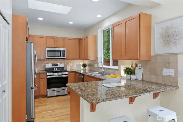 Well-appointed kitchen with full-height backsplash. Well-appointed kitchen with full-height backsplash.