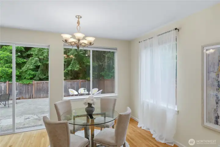Dining area with slider to the expansive patio. Dining area with slider to the expansive patio.