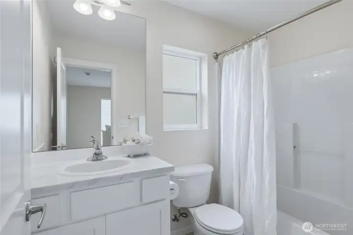 Upstairs hall bathroom. Upstairs hall bathroom.