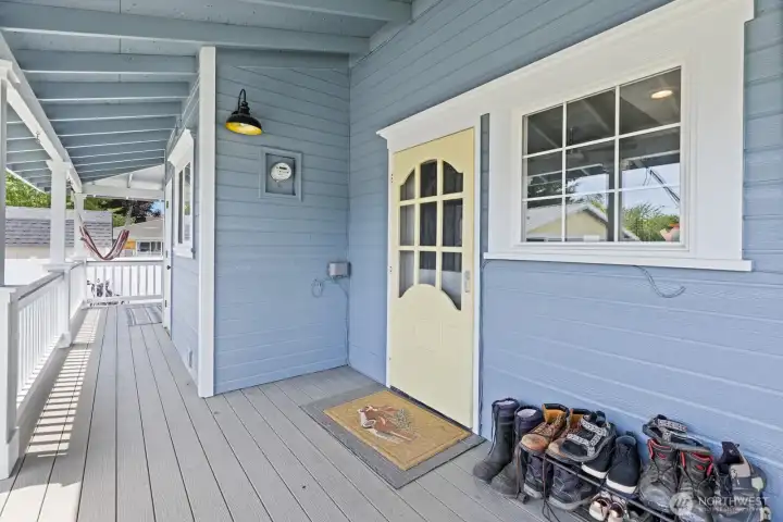 Covered porch entrance to kitchen/dining area.