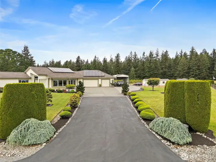Meticulously Manicured 3.78 Acre Parcel with Extended Drive!