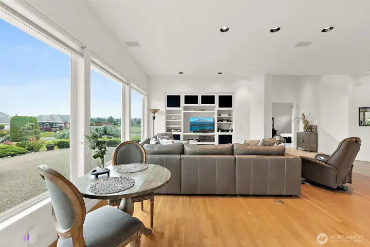 Walls of Windows, Hardwood Floors, & Built-ins