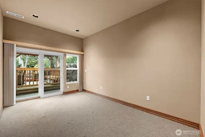 Bedroom #3.Complete w/ Walk-in Closet. Sliding Glass Door Leads Out to Courtyard & Covered Deck!