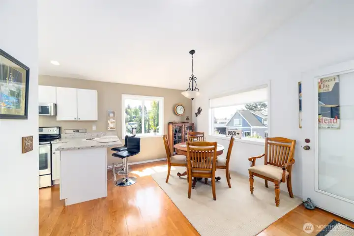 Dining room with partial view of kitchen Dining room with partial view of kitchen