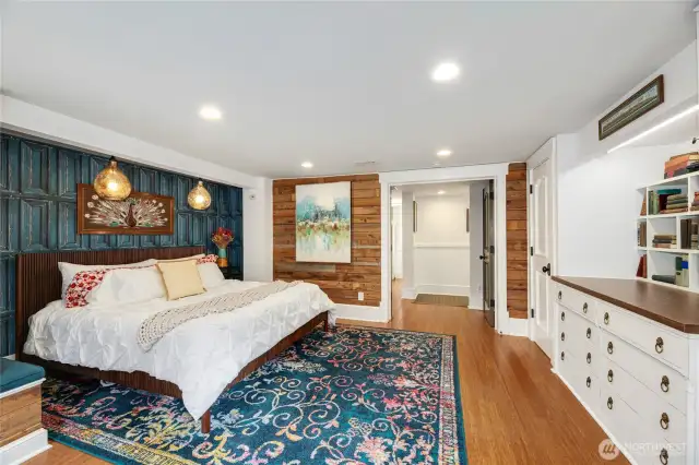 Enter through the French Doors into this Primary bedroom that has plenty of storage with built-in drawers, shelves &  additional closet in seperate from the walk-in closet with organziers.