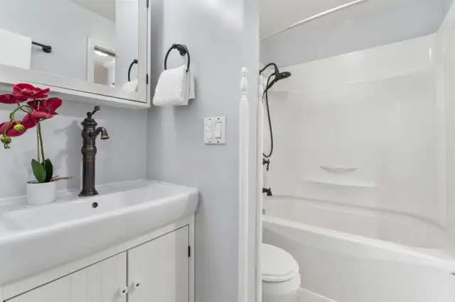 Bathroom with soaking tub.