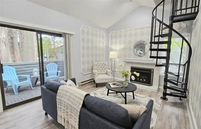 Living room with sliding door to spacious deck.