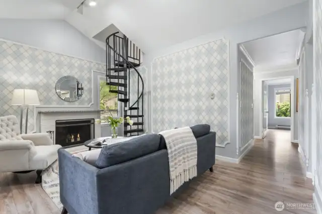 Spiral stairs to the 3rd bedroom on upper level.
