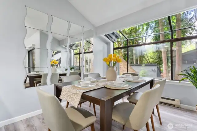 Dining room with large windows.