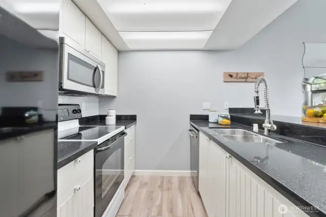 Kitchen with granite countertops.