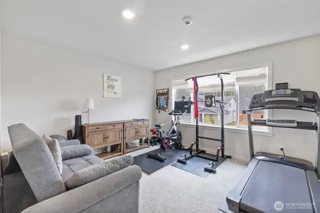 Upstairs bonus area / gym or extra TV room