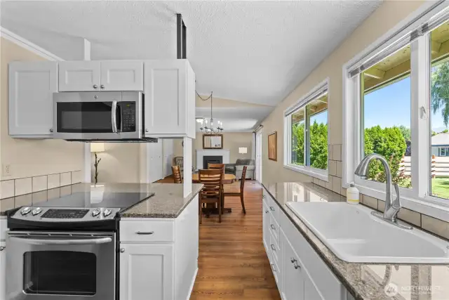 Kitchen open to dining space and family roo