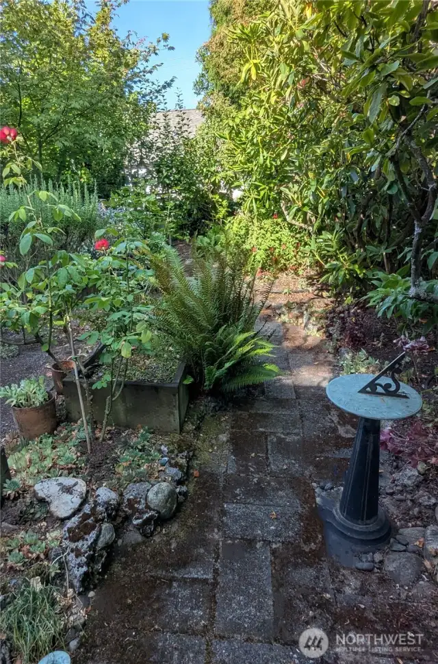 Back garden is romantic and full of lovely details