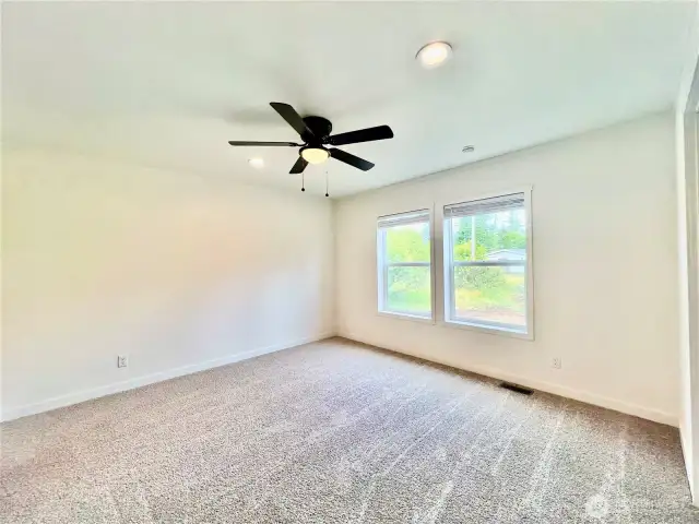 Master bedroom is large with good light   walk in closet and bath