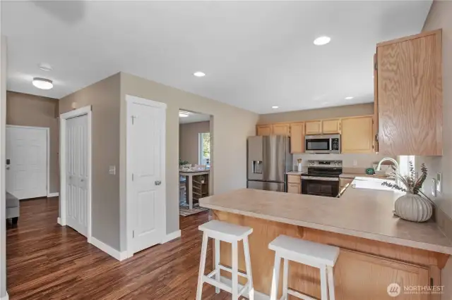 From the entry way straight down the hall is the kitchen, has all stainless steel appliances
