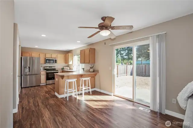 The area off of the kitchen could be another place to put a table if you want to use the dining area for an office area.