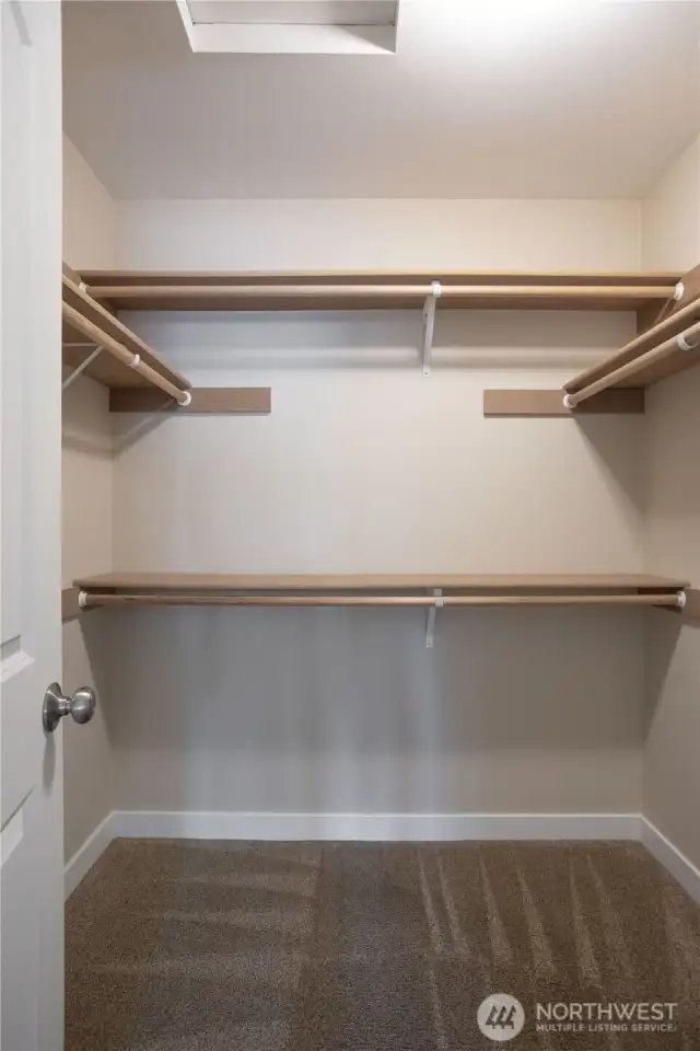 Walk-in closet for third bedroom.