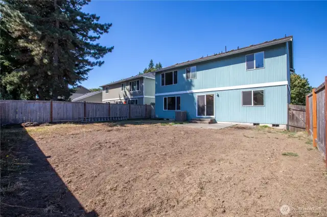 Very spacious backyard is an open canvas.