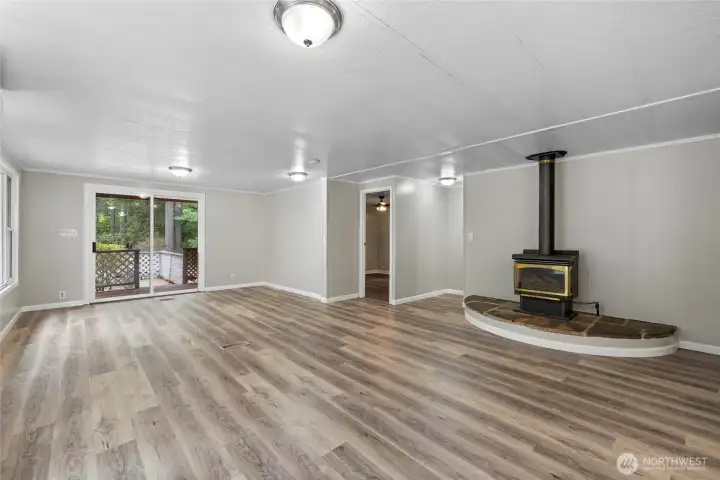 Large great room with  freestanding propane stove