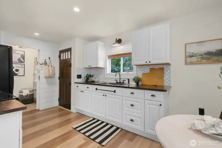 Northern and eastern facing windows help this kitchen to feel bright year round