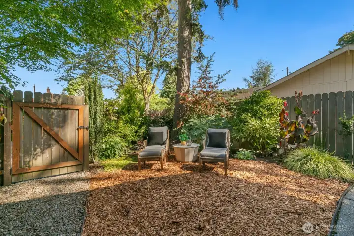 Find spaces for recreation and retreat all around this fully fenced lot.