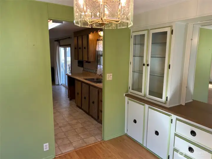 Kitchen is just off the formal dining space
