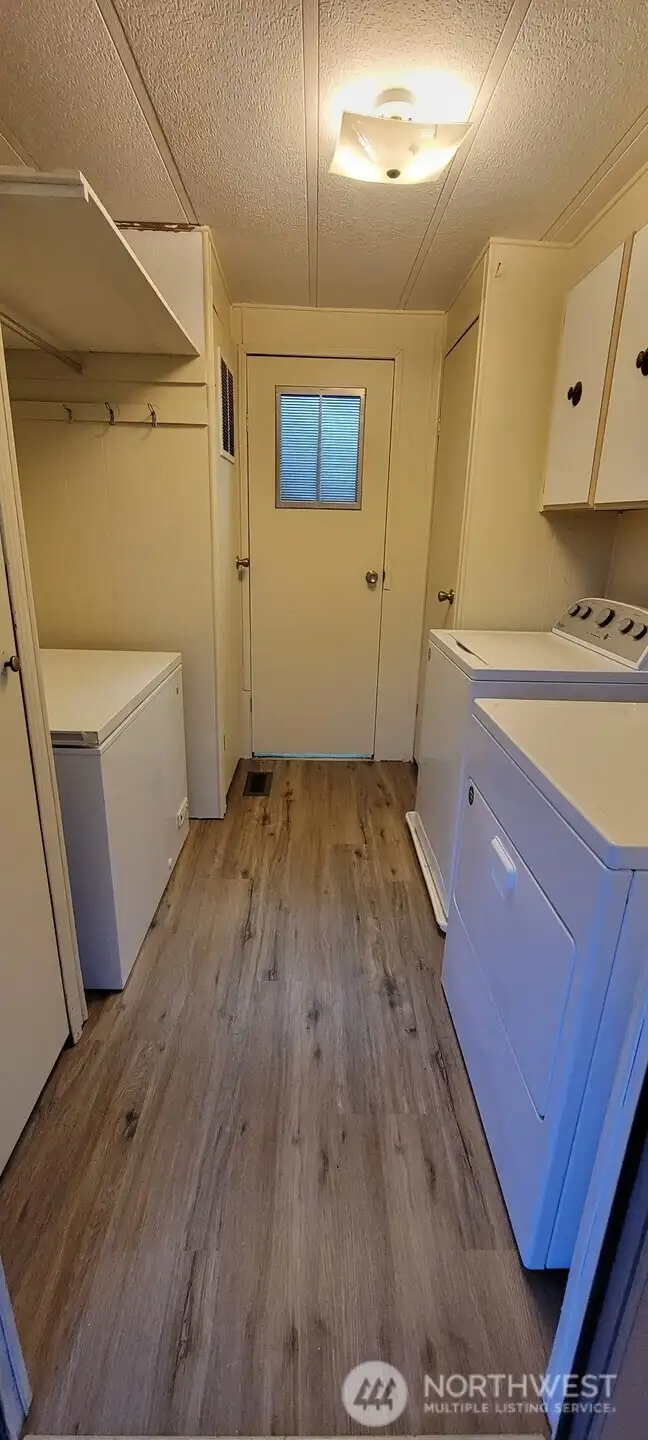 Plenty of storage in the utility room and chest freezer stays.
