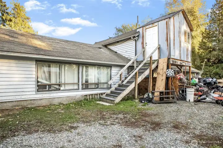 Outdoor stairs that lead to studio