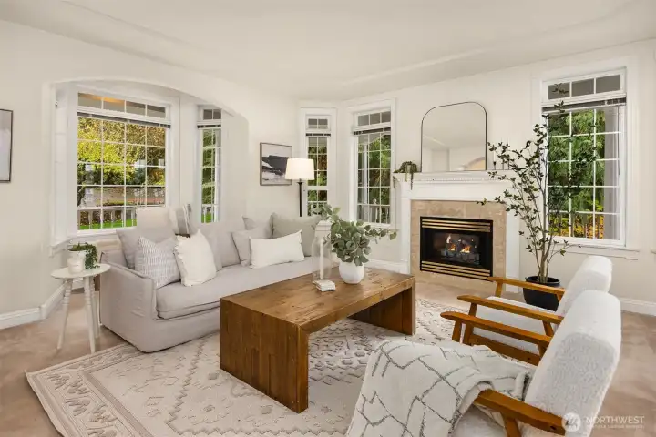 Ample formal living with gas fireplace