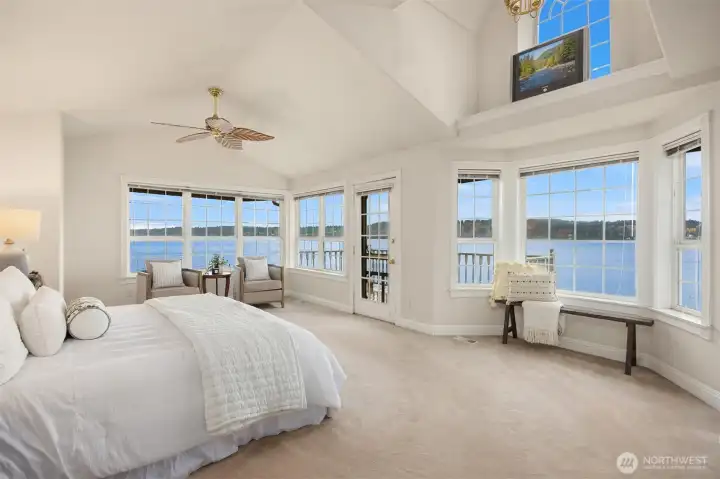 Massive primary with stunning views, door to private deck and gas fireplace.