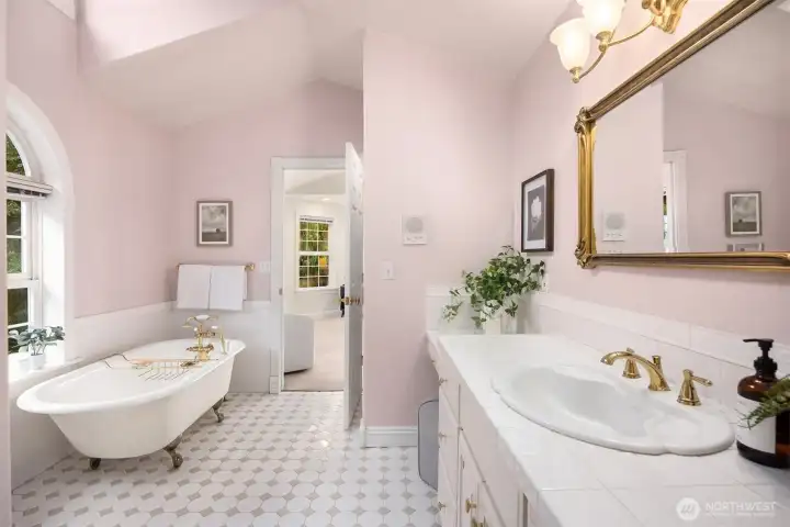 Hall bath with access from bedroom 2 and hallway.