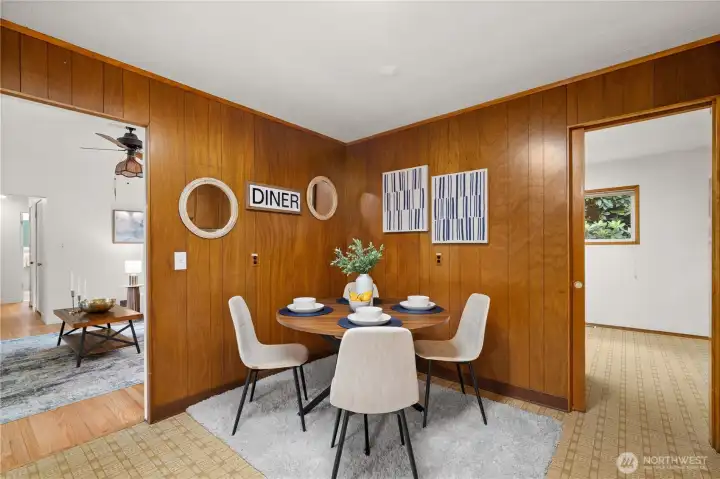 This area adjoins the kitchen and works well for casual meals. This area adjoins the kitchen and works well for casual meals.