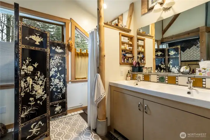 Full bathroom with dual vanity