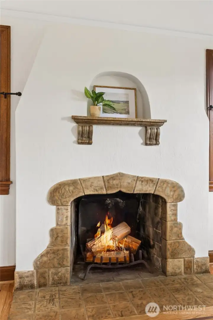 Classic tiled wood burning fireplace.
