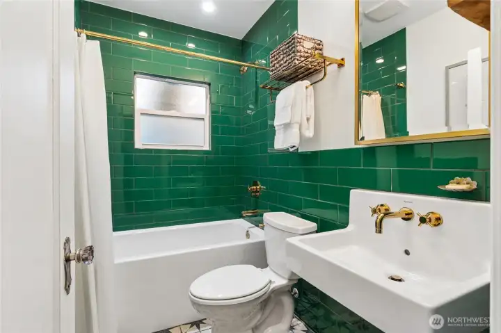 Large soaking tub in a beautifully updated bath.