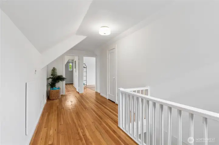 Huge upper hall and closet would make an easy bath addition.