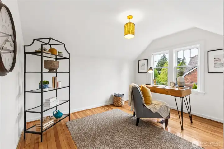 Fourth bedroom upstairs overlooking gardens….