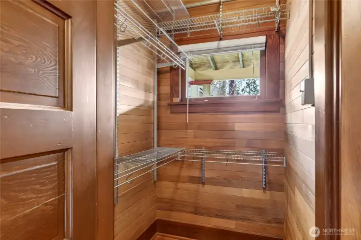 Each bedroom has a large closet that has been designed with hanging racks and shelves that go to the ceiling to maximize space.