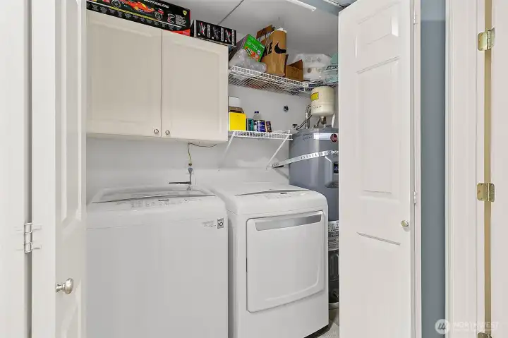Laundry room with storage cabinets
