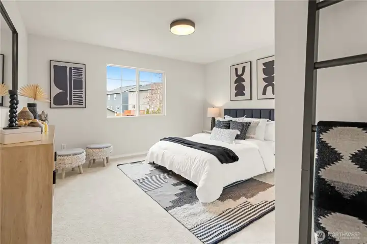 Upper level bedroom. This is one of four bedrooms upstairs in the home.