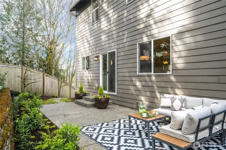 The fully fenced yard offers pets an opportunity to roam around freely.