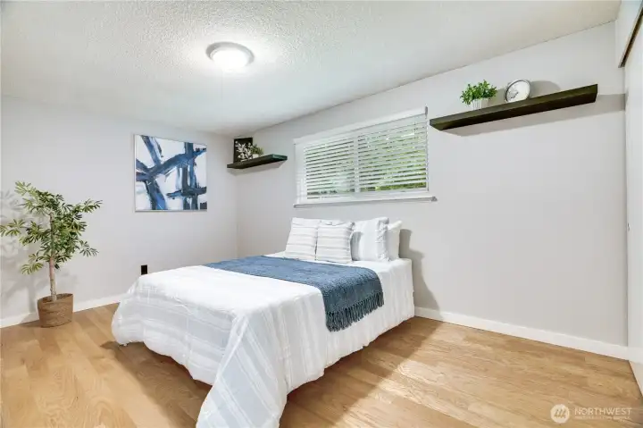 Generously sized guest bedroom with plenty of space for guests or everyday living