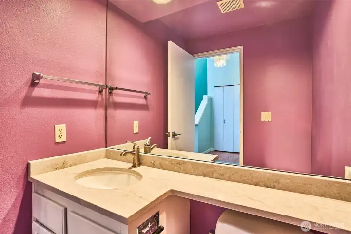 This is the main floor half-bath, powder room.