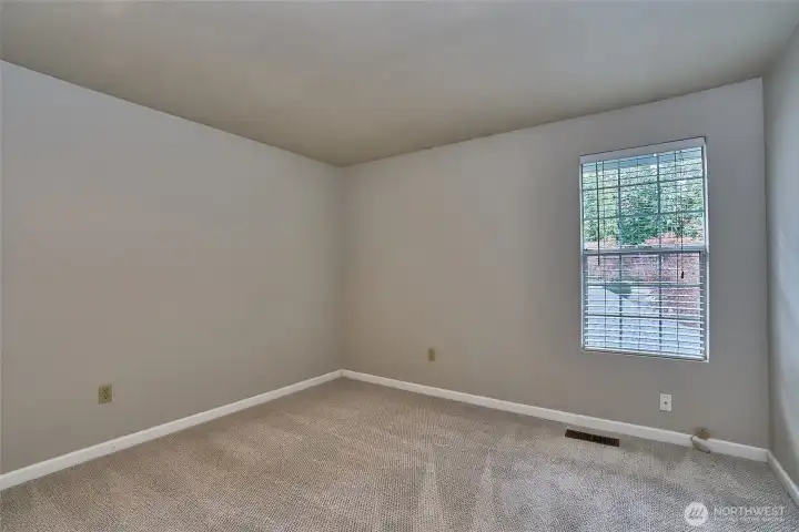 This shows the second bedroom located upstairs as well.