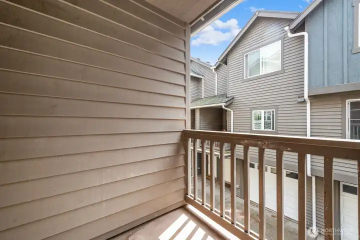 Nice size covered deck off the kitchen.