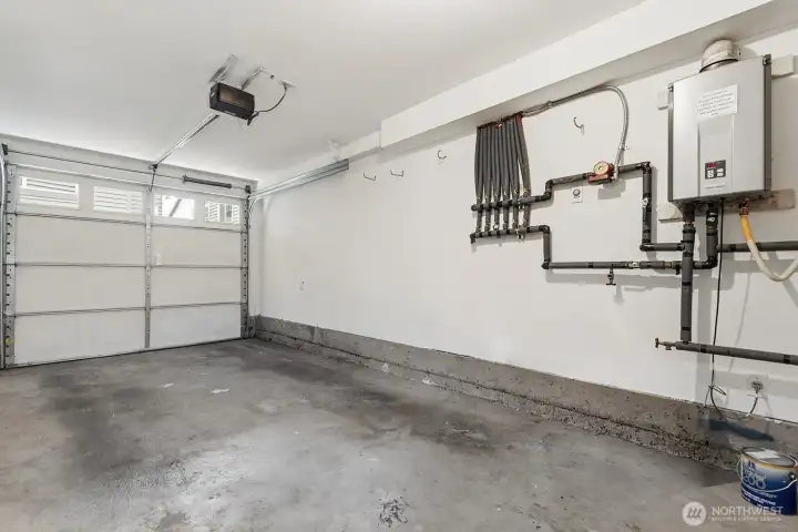Nice sized private garage and recently serviced on demand hot water tank