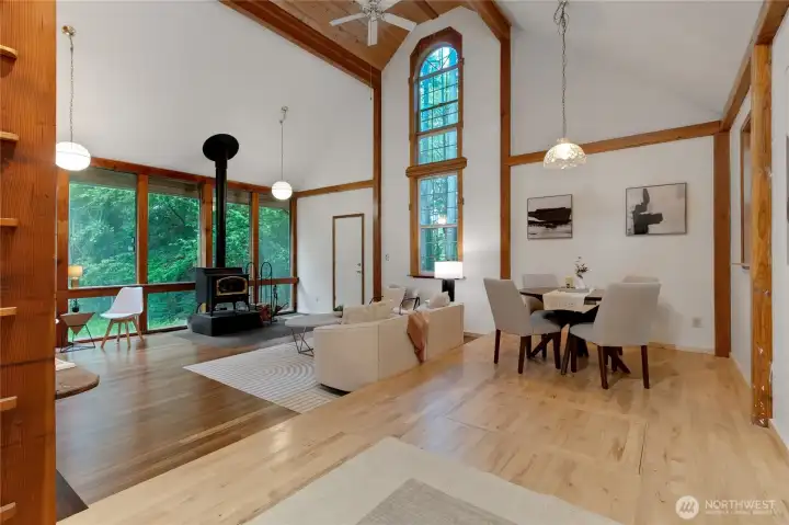 The sunken living room has new bamboo flooring. This space is massive. There are endless possibilities of how to set this space up to work for you!