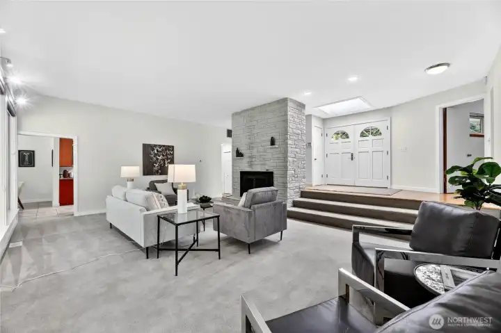 Very large living room with gas fireplace.