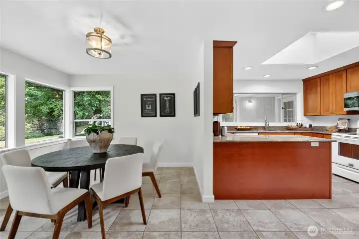 Dining area can hold a large round or rectangular table.