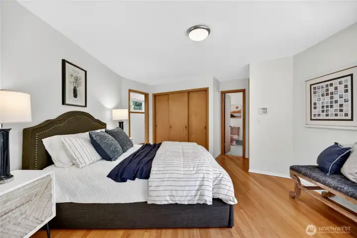 Primary Bedroom with two closets and en Suite Bath.